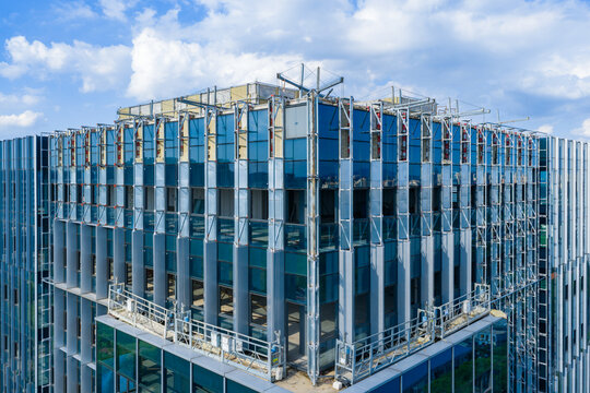 Close-up view of unfinished office building under construction