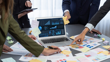 Analyst team use sticky note for creative and analytic brainstorm for business idea with BI data...