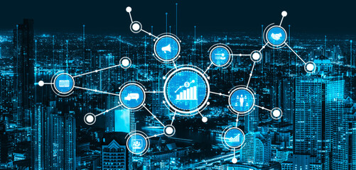 A visually striking representation of a digital network connecting various business icons against a night city skyline, highlighting technology and data communication. Tessel