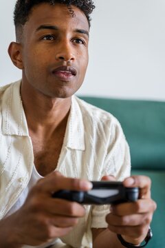 Gamer concentrating on playing video games
