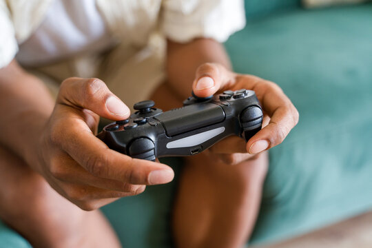 Gamer holding a gamepad 