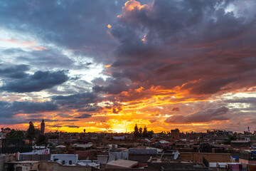 Sunset over Marrakesh rooftops and Koutoubia Mosque

