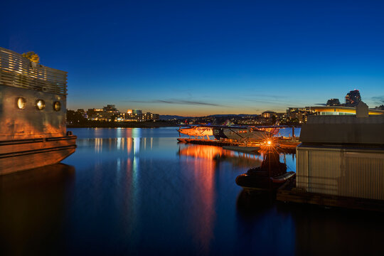 Night View of Victoria Inner Harbour with Floatplanes and Reflections
