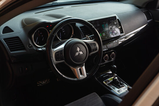 Mitsubishi Lancer Evolution X interior cockpit, Japanese rally car dashboard and steering wheel

