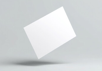 Blank white card floating in the air mockup for business design presentation or invitation isolated on a gray background