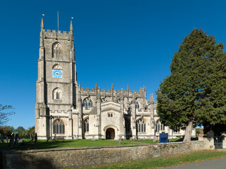 Saint Mary's Church Steeple Ashton.  Sunshine, wide angle, Pretty country church surrounded by fields