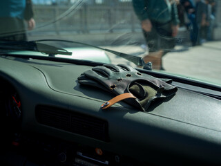 Classic Car Dashboard with Driving Gloves