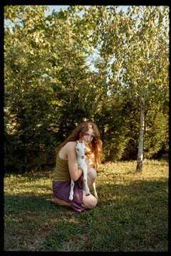 Woman holding goat