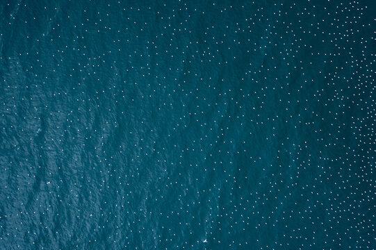 Calm Ocean Waters With Scattered Boats During Sunny Daylight Hours