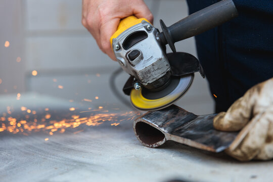Sparks Flying While Sharpening Axe Edge