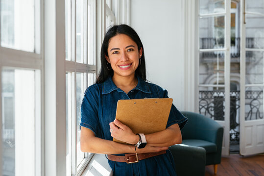 Beautiful woman in bright office