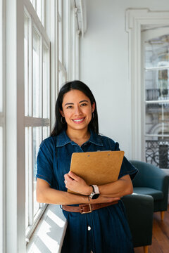 Beautiful woman in bright office