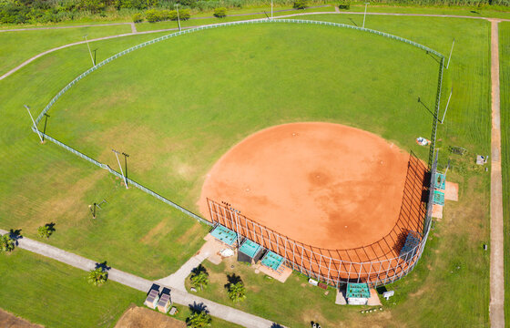Aerial View of Baseball Field with Red Dirt Infield Green Grass