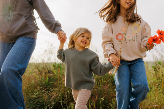 Happy family enjoying a walk in nature