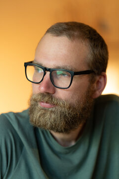 Close-Up Portrait of Bearded Man with Glasses