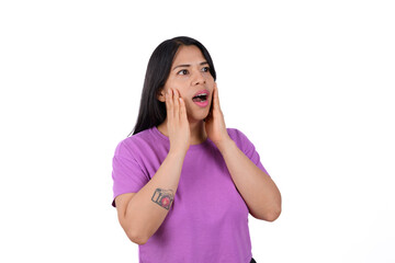 Fototapeta premium Isolated woman on white background looking concerned with her hands on her face, facing right