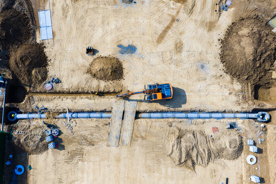 Aerial view of excavator working on construction site