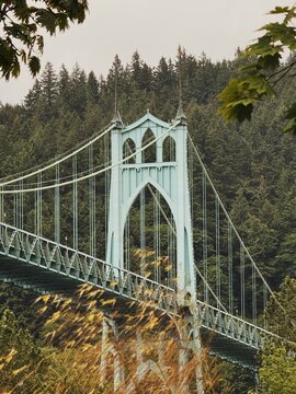 St. Johns Bridge Tower Against Forested Hillside in Portland, Oregon