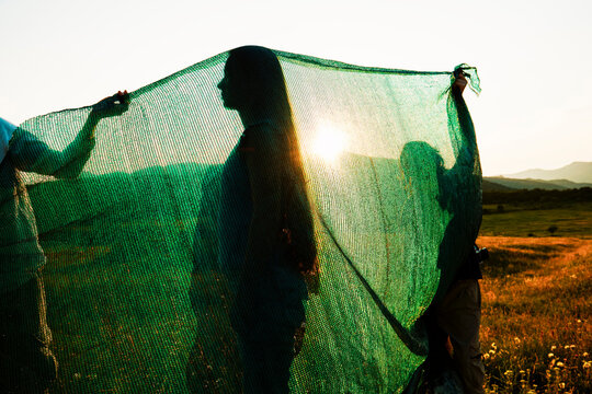 Mesh Screen with Human Silhouettes