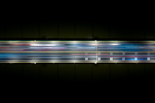 Aerial view of illuminated highway at night