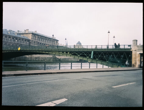 Analog Film Photograph of a Historic Bridge Over the River