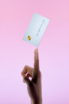Debit / credit card rests on hand 