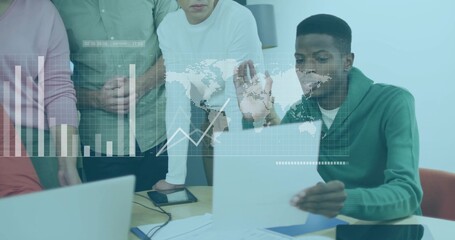 Professionals collaborating around conference table, reviewing printed reports, devices and overlay
