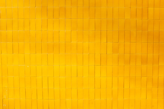 Corner of building with glass and ceramic tiles in urban city 