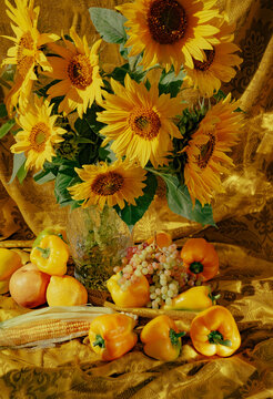 Sunflowers and fruits show harmony