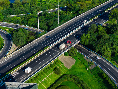 Aerial view of highway interchange with curved ramp