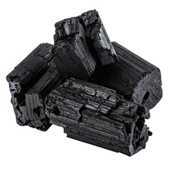 Close-up of rough, black charcoal briquettes, angled against a pure black background