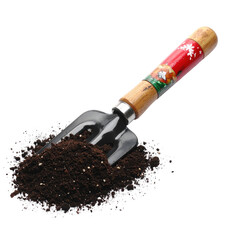 A trowel rests in a pile of rich, dark soil, ready for gardening