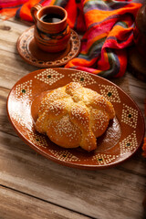 Pan de Muerto. Typical Mexican sweet bread that is consumed in the season of the day of the dead. It is a main element in the altars and offerings in the festivity of the day of the dead.