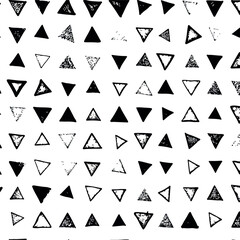 Geometric pattern of triangles in black and white design.
