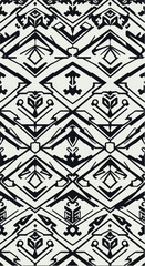 Geometric pattern with symmetrical shapes and intricate designs in black and white.