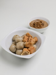 Meatballs and meatball tofu on white bowl