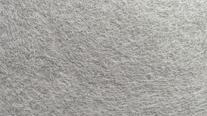 Fine Detailed Close-Up of Grey Non-Woven Felt Fabric Textile Texture for Background and Design