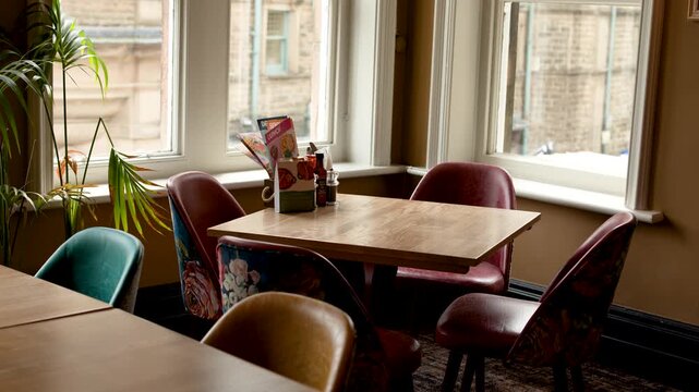 Sunlit Retro Leather Chairs in Vintage Cafe Interior
