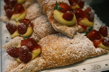 Beautiful decadent colorful puff pastry dessert on display at extraordinary desserts san diego california