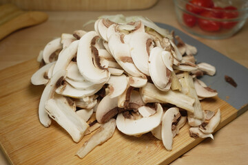 Chopped mushrooms ready for cooking in a kitchen setting