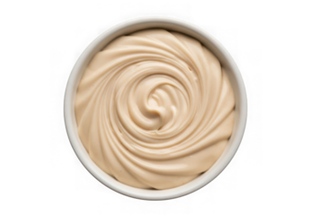 Bowl of tahini isolated on transparent background from above in the studio
