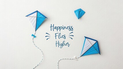 Colorful kites in blue tones with inspirational message of happiness and positive vibes on light background