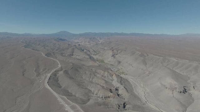 Ancient human figure geoglyph in Tarapaca desert Chile seen from aerial perspective