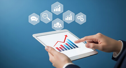 Analyzing seo data and business growth trends on a tablet for digital marketing strategy and financial planning on a blue background