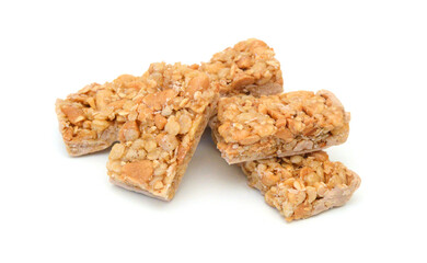 Honey bars with peanuts, sesame and sunflower seeds isolated