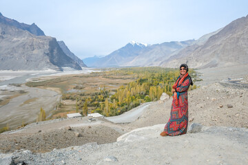 Portrait Muslim traveller  standing on Viewport of Indus River in Skardu, Gilgit-Baltistan, Pakistan.
