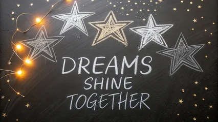 Papier peint photo Citations Inspiring chalkboard art showing the phrase 'Dreams Shine Together' surrounded by stars and fairy lights for motivation  © Haraz