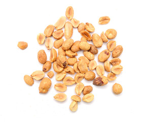 Dried peanuts in closeup on white