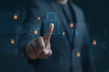 Businessman touching digital padlock icon on virtual screen with source code, symbolizing cybersecurity, data protection, firewall, encryption, secure access, and technology safety