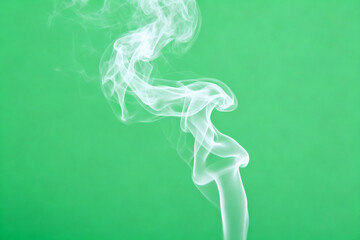 White smoke curling against green background